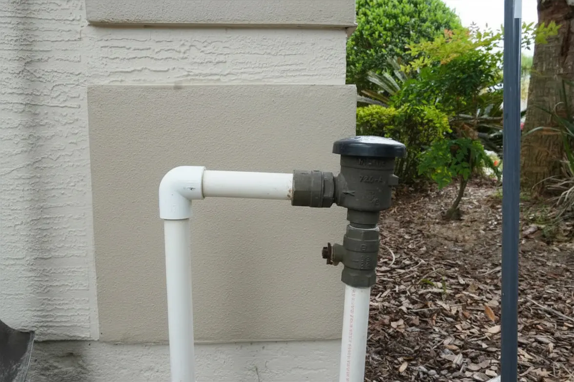 WaterCare wellhead plumbing connection with brass check valve after service