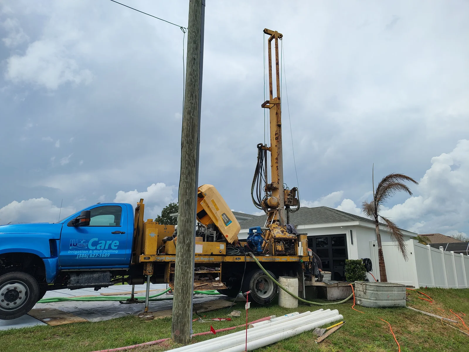 WaterCare residential well drilling rig on site in Northeast Florida